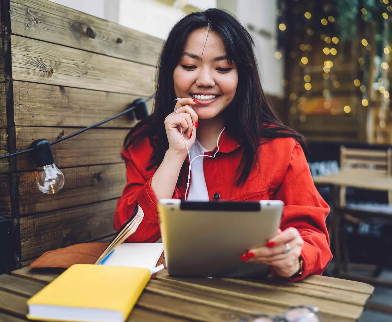Business professional using a phone and tablet
